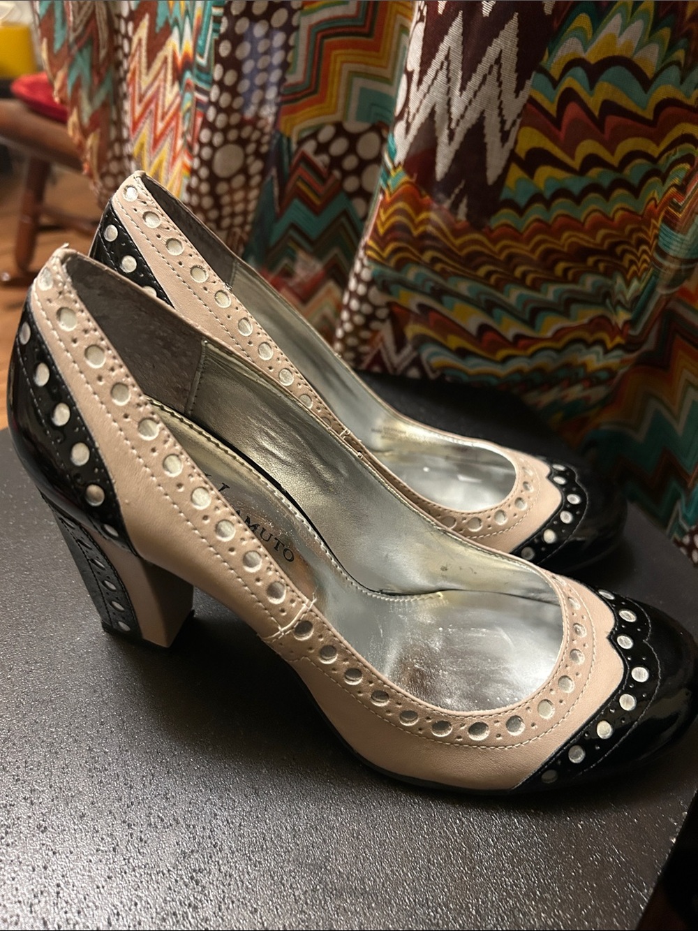 Vince Camuto Two-Tone Oxford Beige and Black Perforated Mid-Heel Pumps